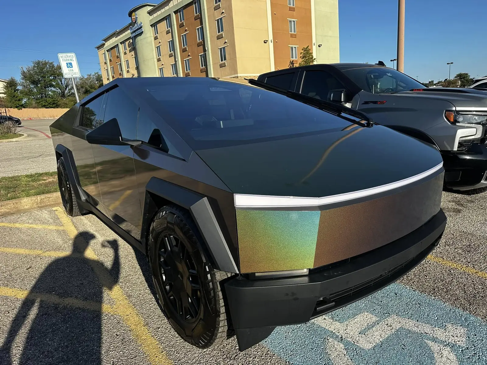 Color-flip wrapped Cybertruck, chameleon finish shifting from green to copper — BSG Wraps, Fort Worth, TX