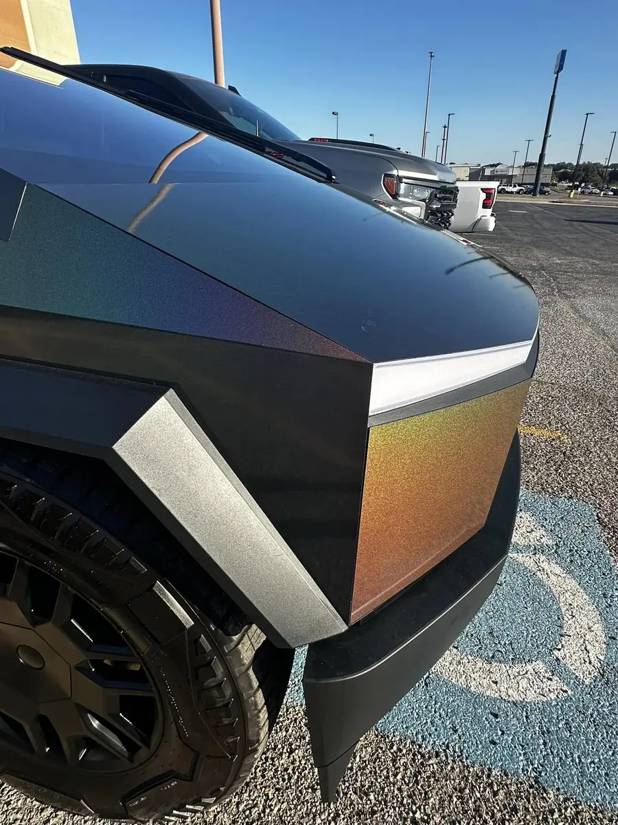 Close-up of color-flip chameleon wrap finish on Cybertruck fender